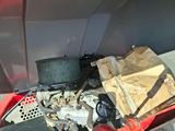 a pile of junk in the back of a truck