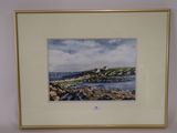 framed watercolor painting of a lighthouse on a rocky beach