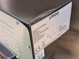 an image of a microwave oven sitting on a counter