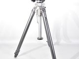 a tripod with a camera on it on a white background
