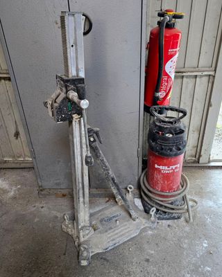 a fire extinguisor and a fire hydrant in a garage