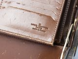 a wallet that has a card holder inside of it