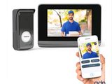 someone holding a smart phone and a smart device with a picture of a man on the screen