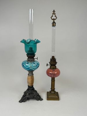 pair of antique glass candlesticks and a glass oil lamp