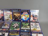 a lot of video games sitting on a table