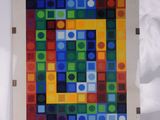 an image of a picture of a colorful square pattern on a white background