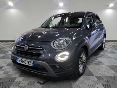 the grey fiat suv is parked on a checkered floor