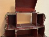 a small wooden box that is on top of a table