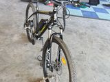 a bicycle that is parked in a garage