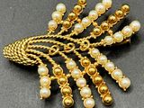 pearl and gold - plated broochle with chain