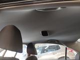 a view of the back of a car from the passenger seat
