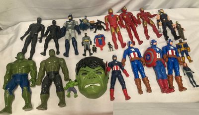 a lot of action figures that are on the table