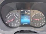 a close up of a car dashboard with various gauges
