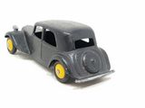 a toy car that is sitting on a white surface