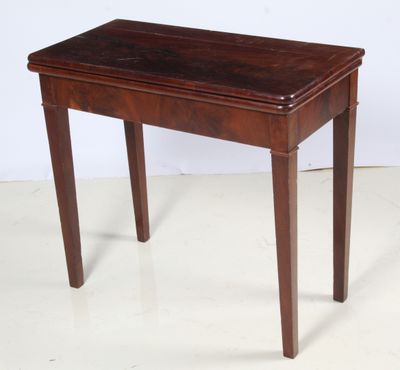 an image of a small wooden table on a white floor