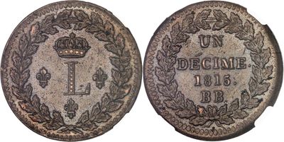 a silver coin with a crown on the front and a crown on the back