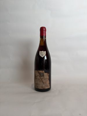 a bottle of wine that is sitting on a table