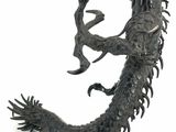 statue of a dragon with a man on it ' s back on a white background