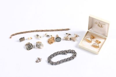 an assortment of jewelry including a bracelet, ring, bracelet, and bracelet box