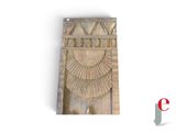 a picture of a wooden plaque with a sun design on it