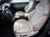 a picture of a car interior with a steering wheel