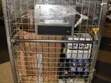 a metal cart with a bunch of items inside of it