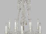 lustre en cristal à cinq lumières orné d'une perle de cristal rouge
