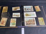 a lot of stamps on a binder on a table