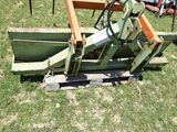 a machine that is sitting on the grass in the yard