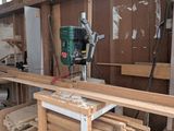 a picture of a workbench with a drillet in it