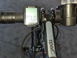 a close up of a bike handlebar with a gps device on it