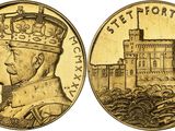 une image représentant une pièce « sovereign » en or, avec un château en arrière-plan