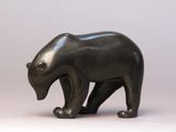 a black bear statue on a white background