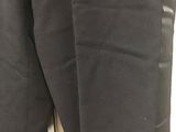 a close up of a pair of black pants on a mannequin mannequin mannequin mannequin mannequin mannequin mannequin