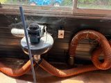 a hose that is connected to a water heater