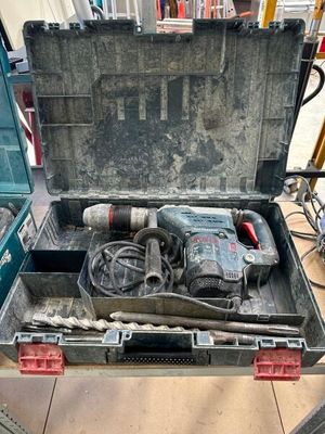 a tool box with tools in it sitting on a table