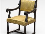 an image of a chair with a yellow upholstered upholstered seat