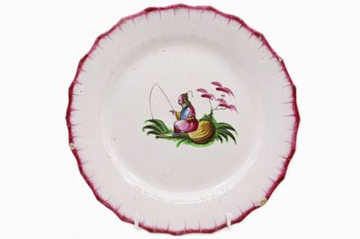 LES ISLETTES Assiette de forme chantournée en faïence émaill…