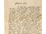 une lettre écrite en cursive sur une feuille de papier