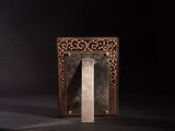 an image of a mirror sitting on top of a table next to a wall