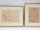 two framed drawings of a nude woman and a nude man