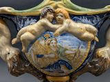 a vase with a picture of two cherenshes on it