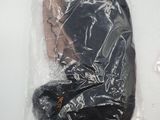 a plastic bag with a pair of shoes inside of it
