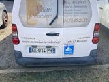 a van that is parked in a parking lot
