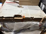 a pile of boxes sitting on a pallet in a warehouse