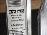 a close up of a bottle of liquid on a table