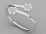 une bague en or blanc sertie de deux diamants