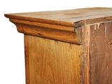 a close up of a wooden cabinet with a white background
