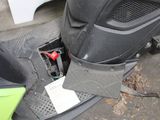 a scooter that has been left on the ground