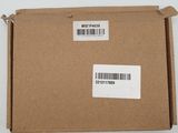 an open box with a barcode on it sitting on top of a table
